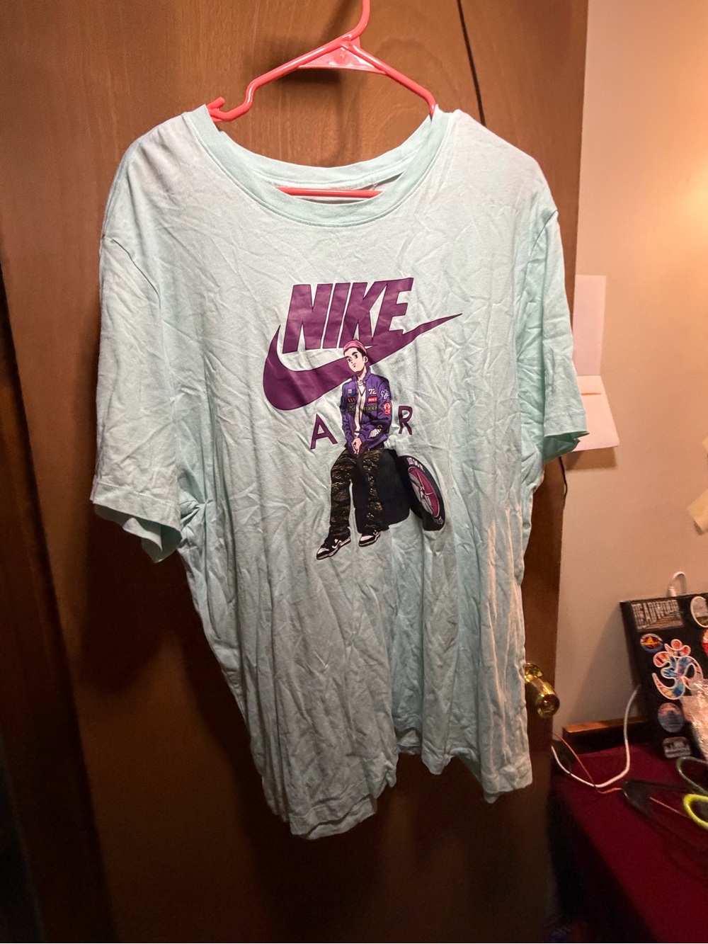 Nike Men’s Light Aqua Graphic Tee with Purple Logo